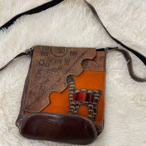 Brown and Orange Crossbody Bag with Unique Design